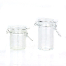 wholesale 55ml 70ml small  Round Cylinder storage Glass jar with locking lid clamp closure